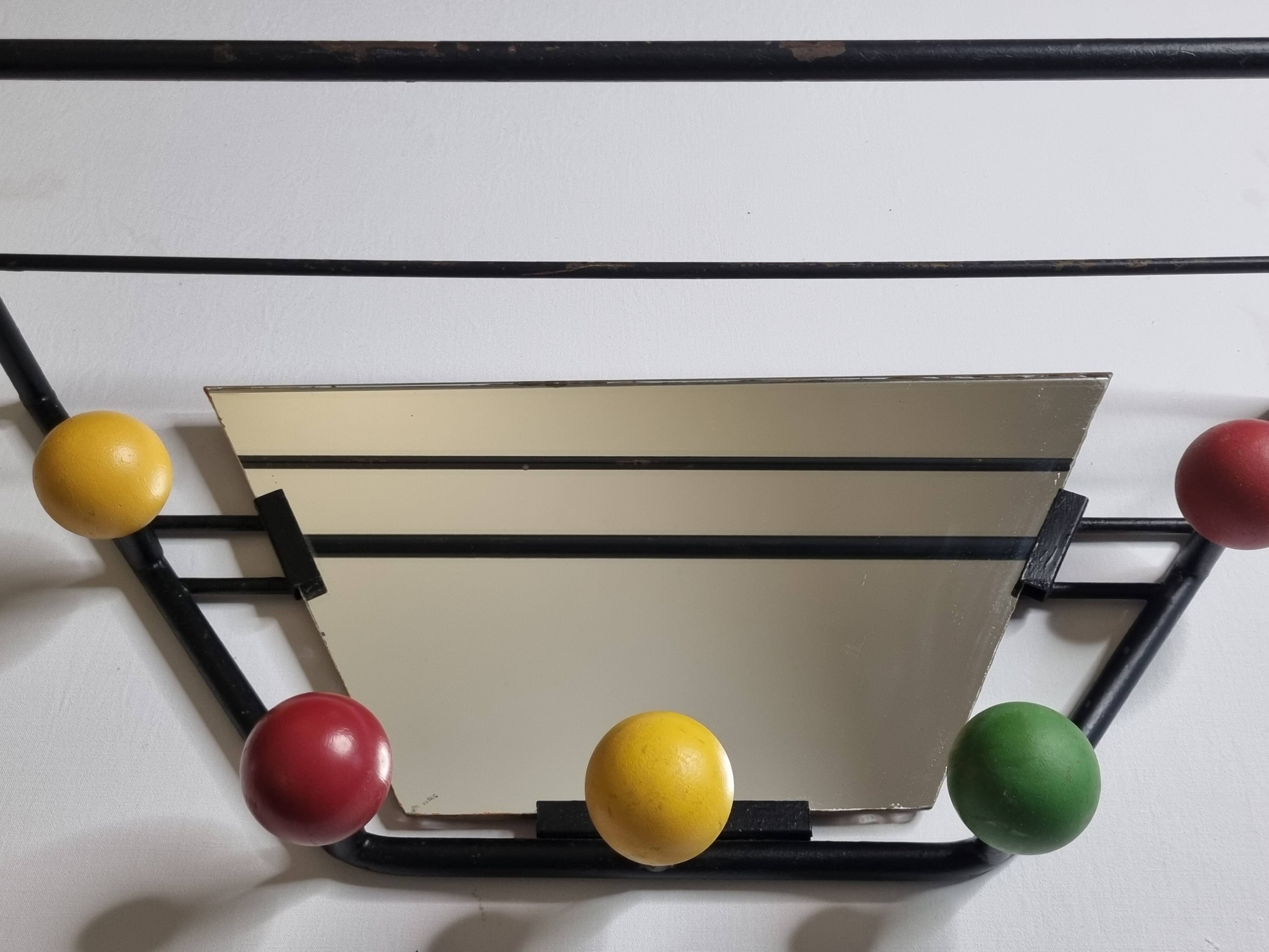 Wall-mounted coat rack with mirror, 5 hooks and hat holder from the 1950s-60s.