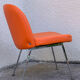 Chauffeuse vintage orange skaï et chrome 1970