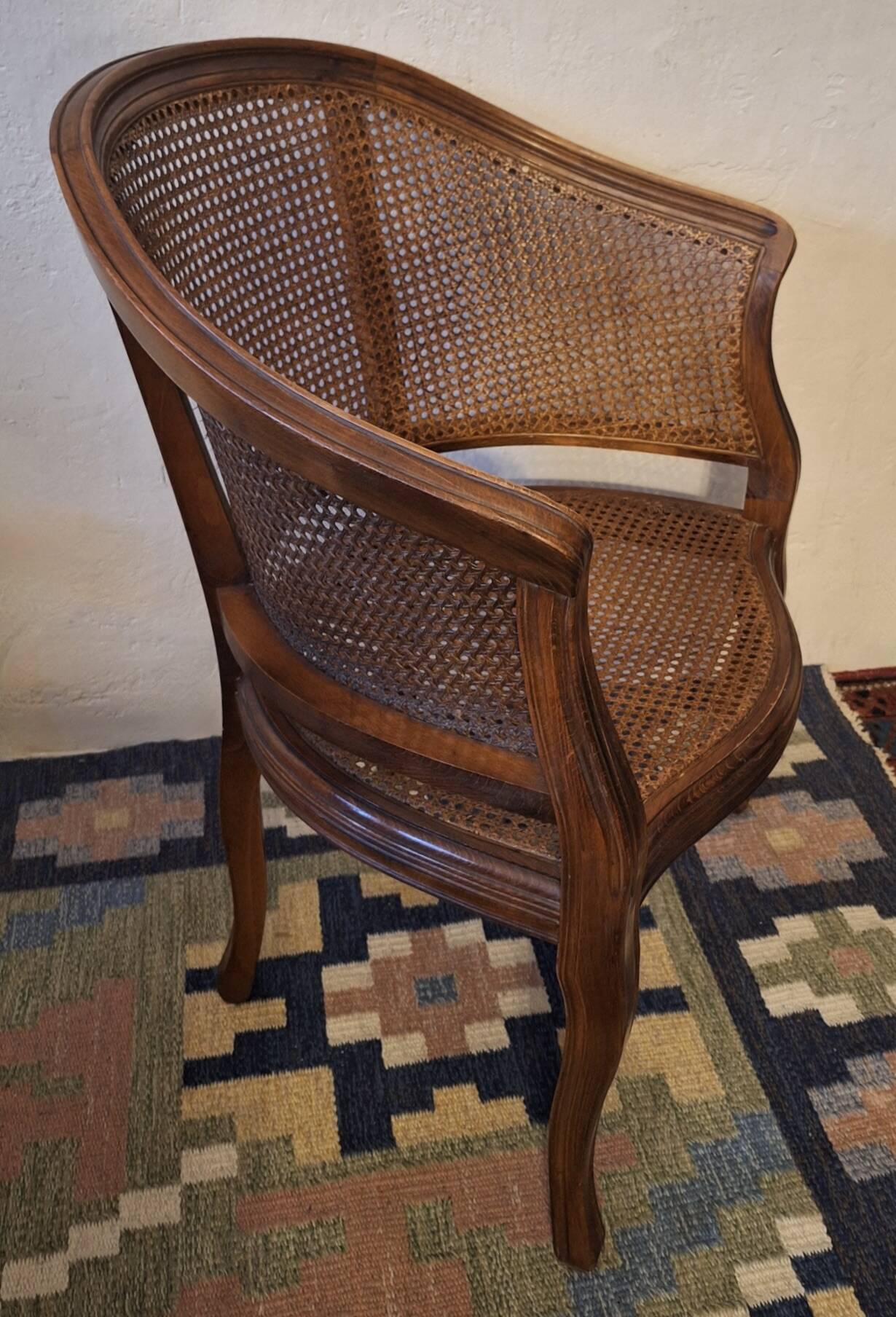 Half-moon rattan and hardwood armchair, early 20th century