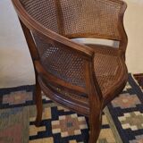 Half-moon rattan and hardwood armchair, early 20th century