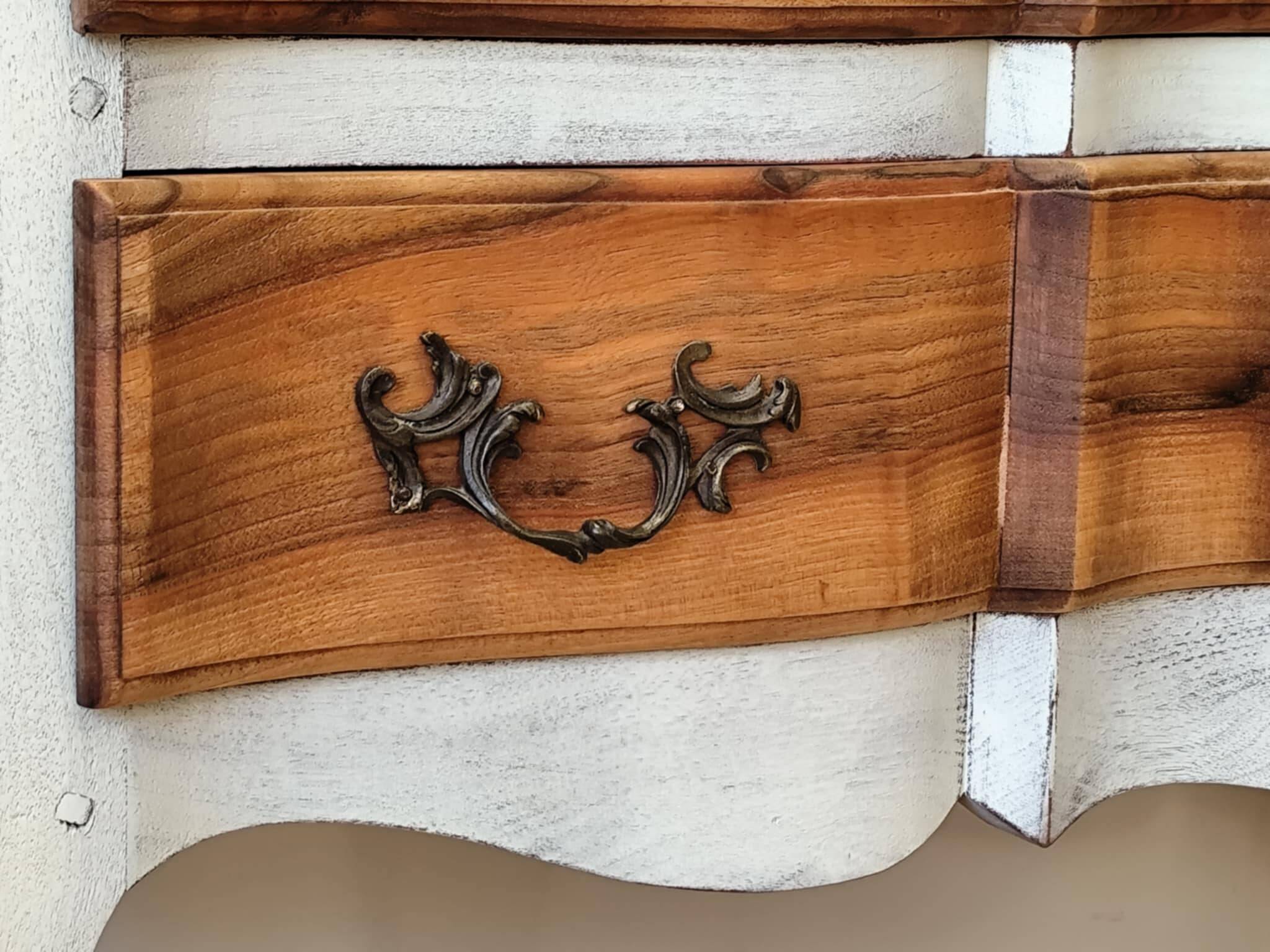 Walnut crossbow chest of drawers