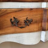 Walnut crossbow chest of drawers