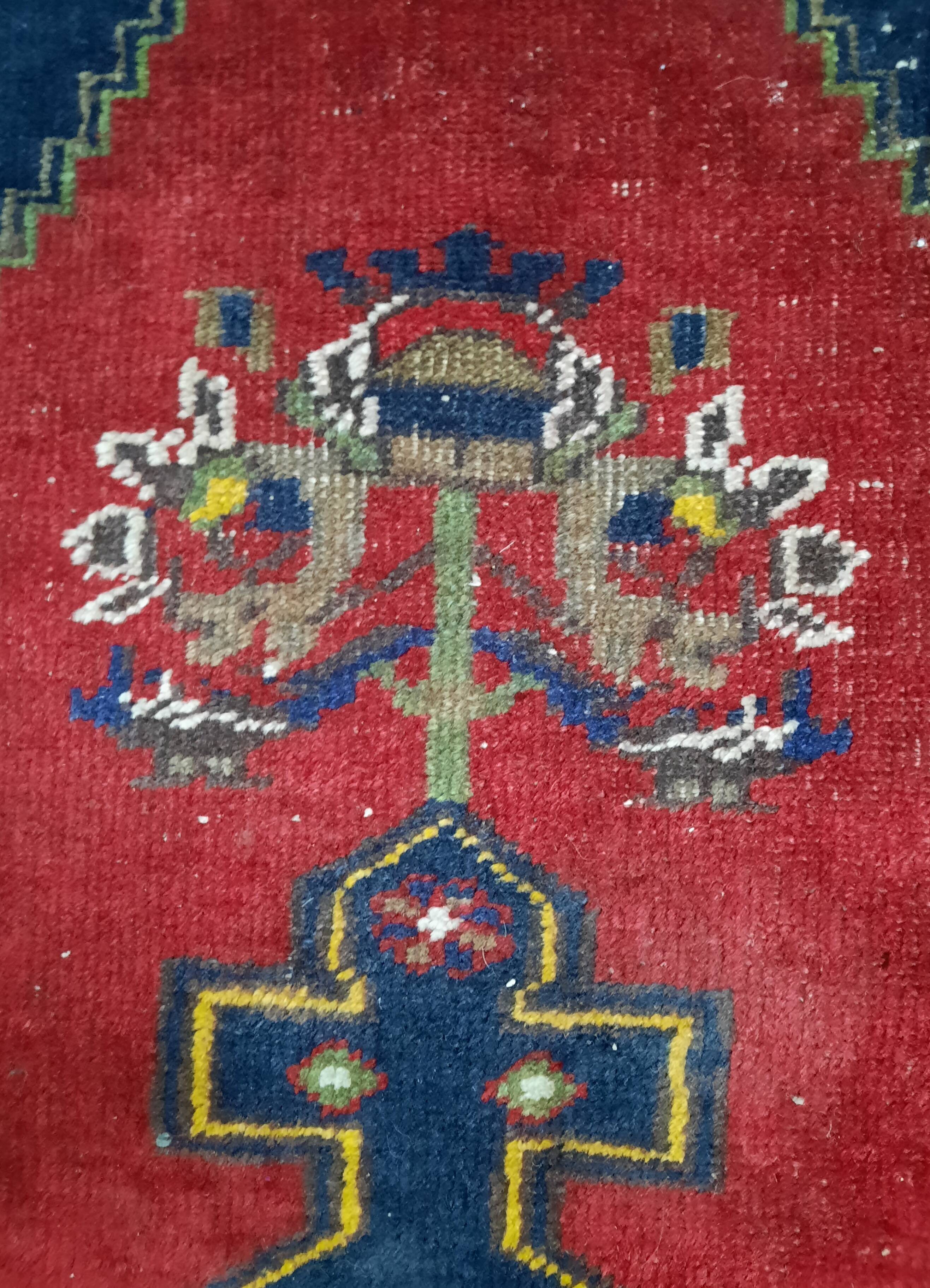 Handmade blue and red rug