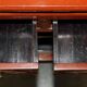 Vintage Chinese lacquered buffet decorated with gold leaf.