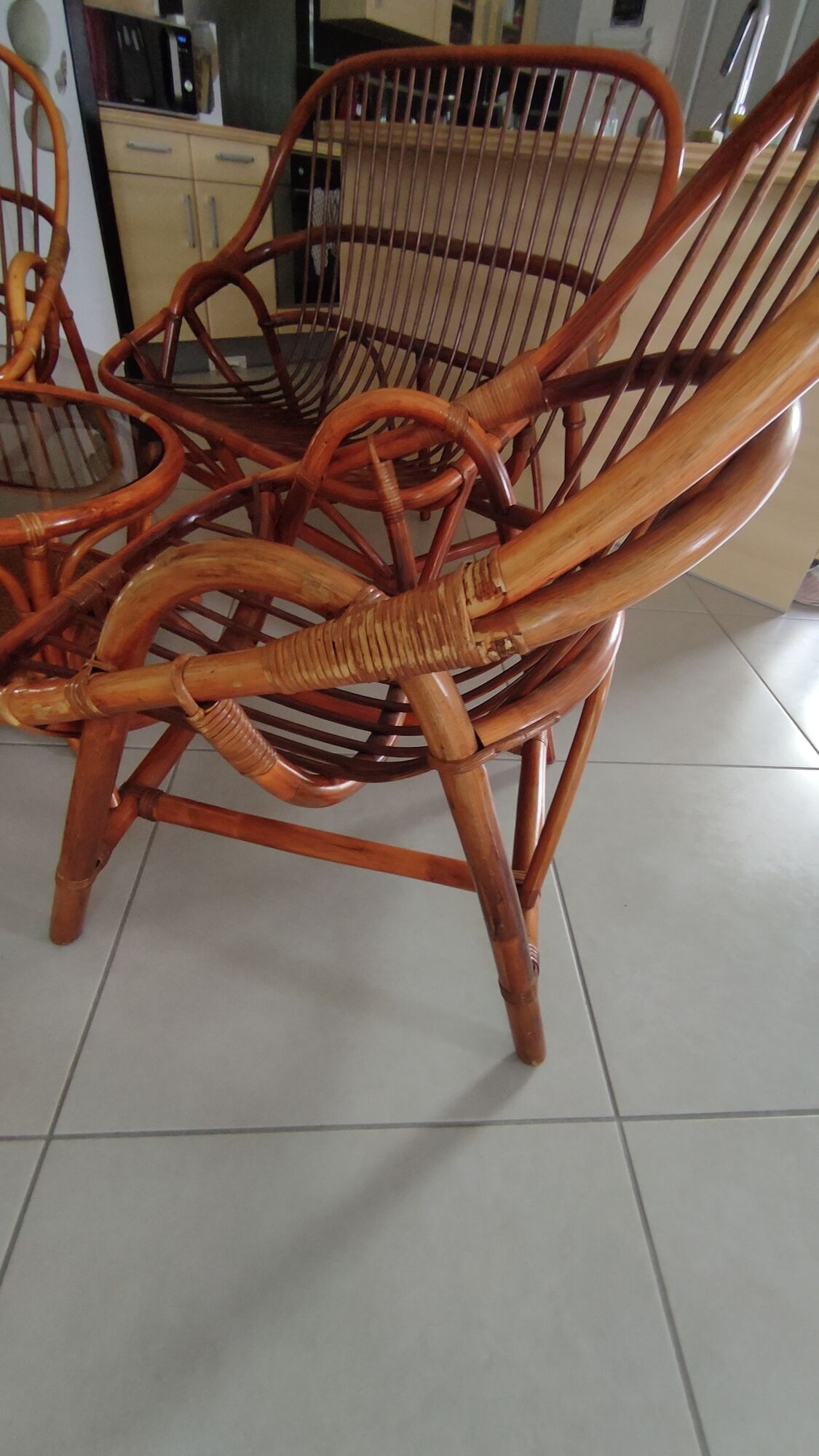 Sofa armchairs and coffee table in vintage rattan of six pieces