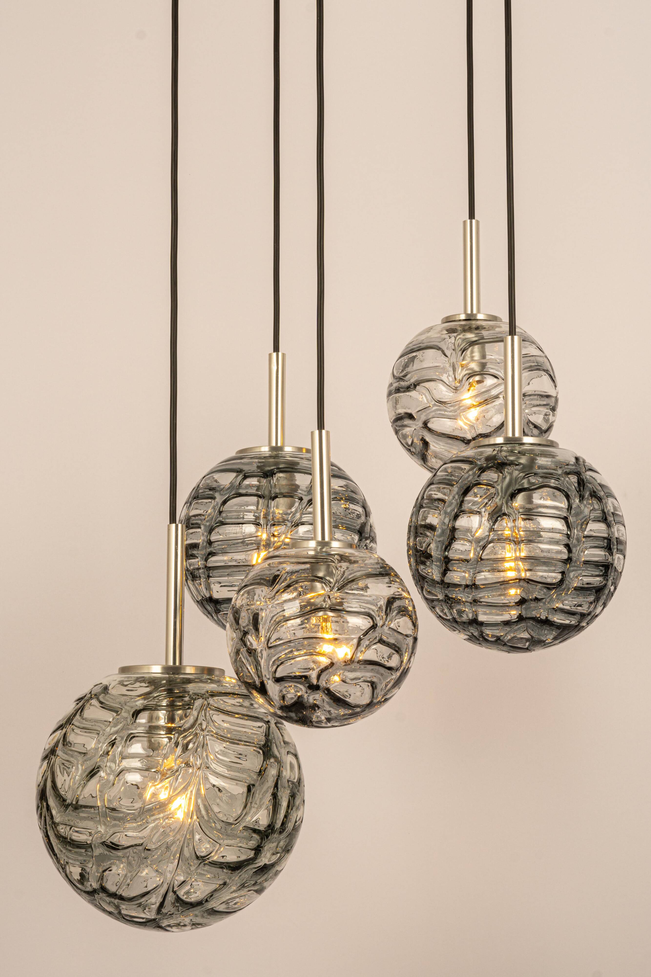 Grand cascading chandelier design with Murano glass by Doria, Germany, 1970s.