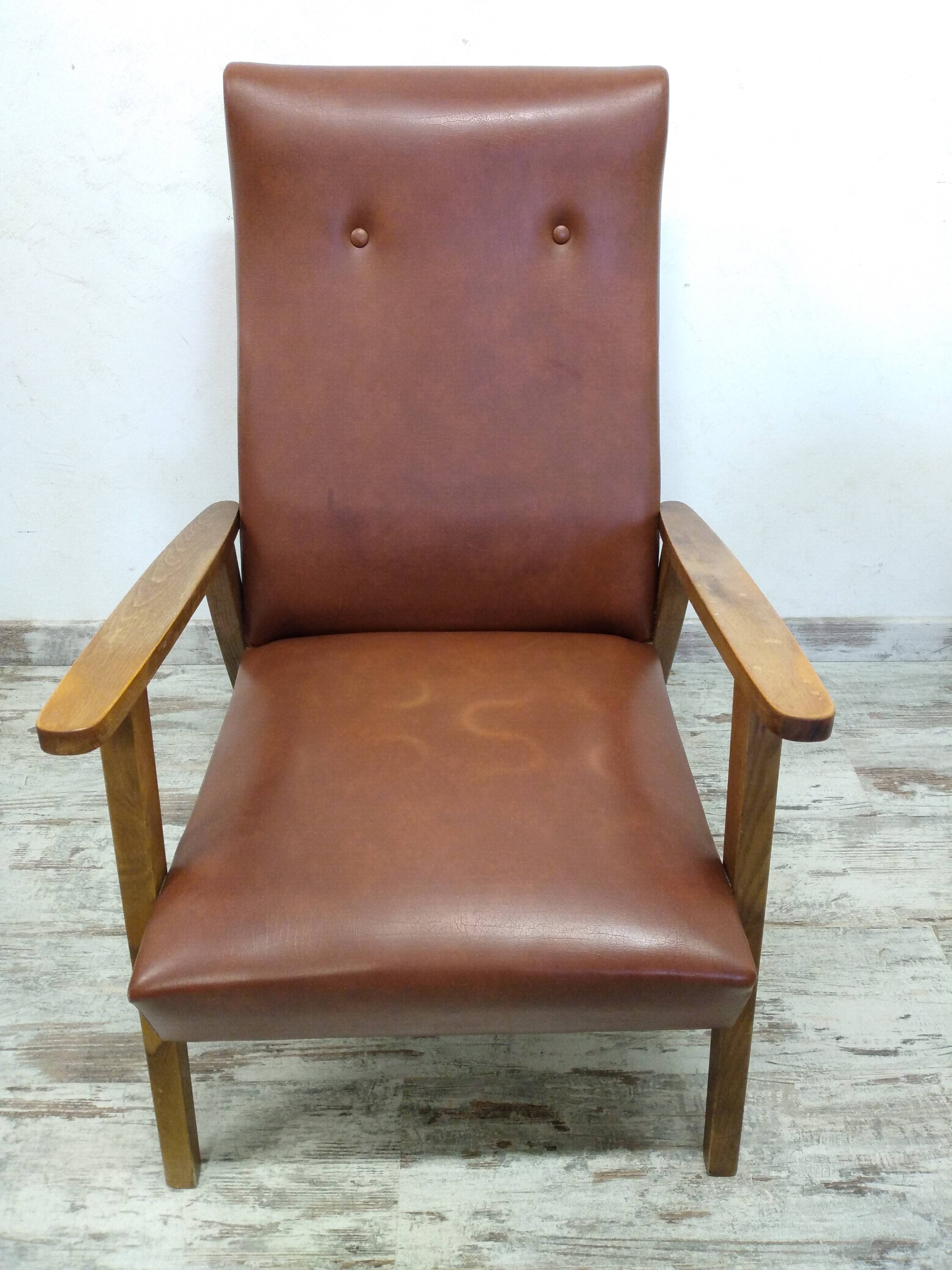 Vintage armchair in wood and imitation leather
