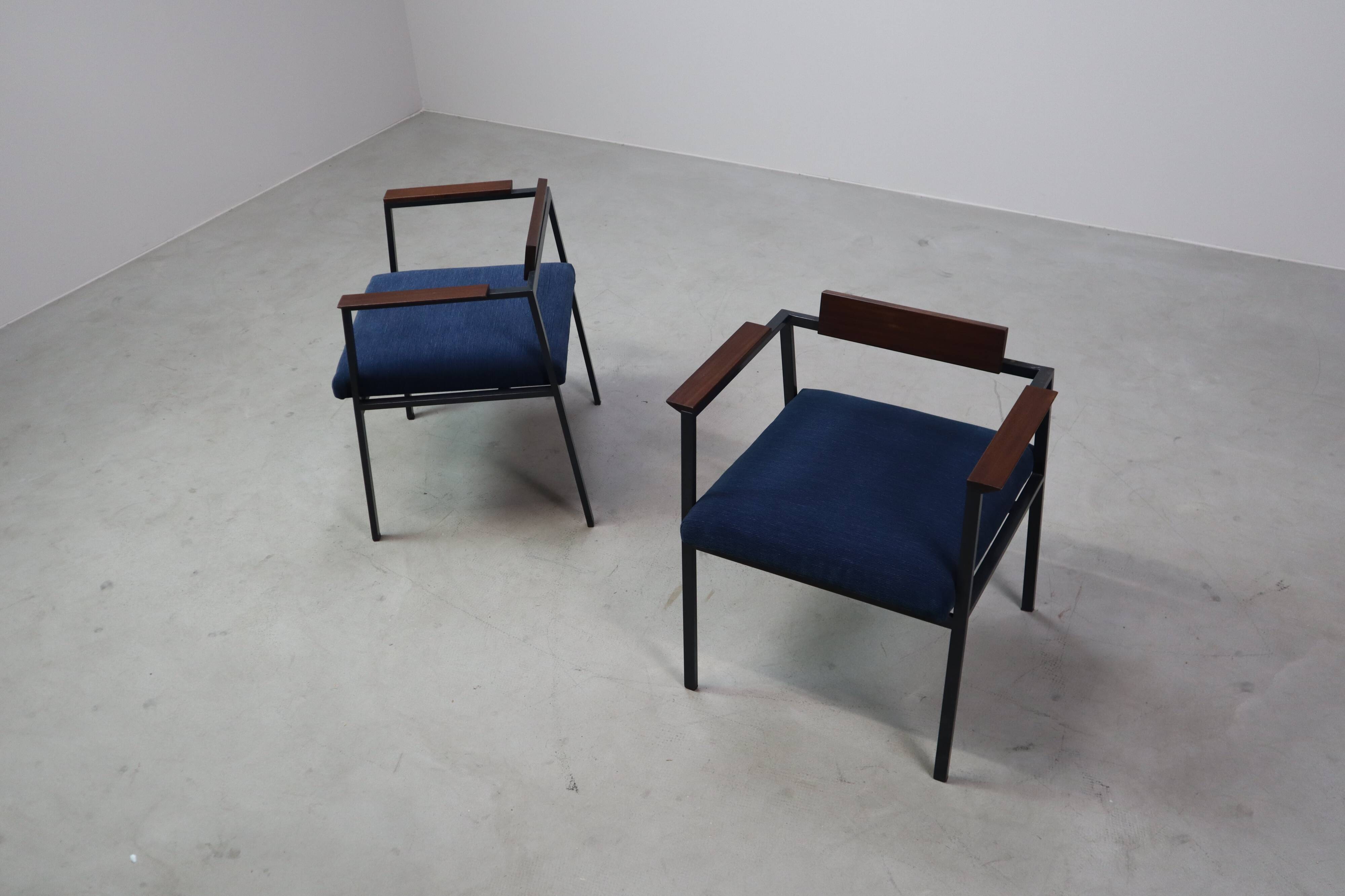 Pair of Postmodern armchairs in steel and mahogany, 1970s