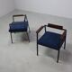 Pair of Postmodern armchairs in steel and mahogany, 1970s