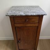 Vintage bedside table in the shape of a wooden column and a gray marble top