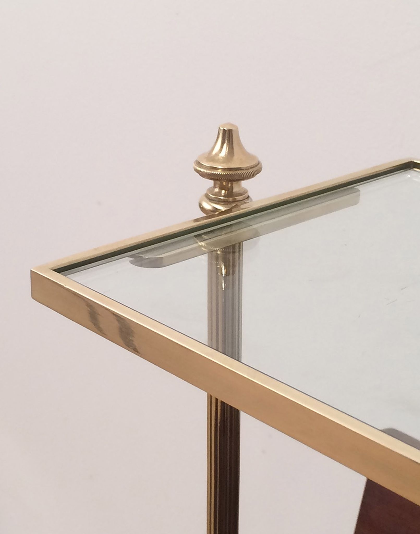 Neoclassical magazine rack in mahogany and brass