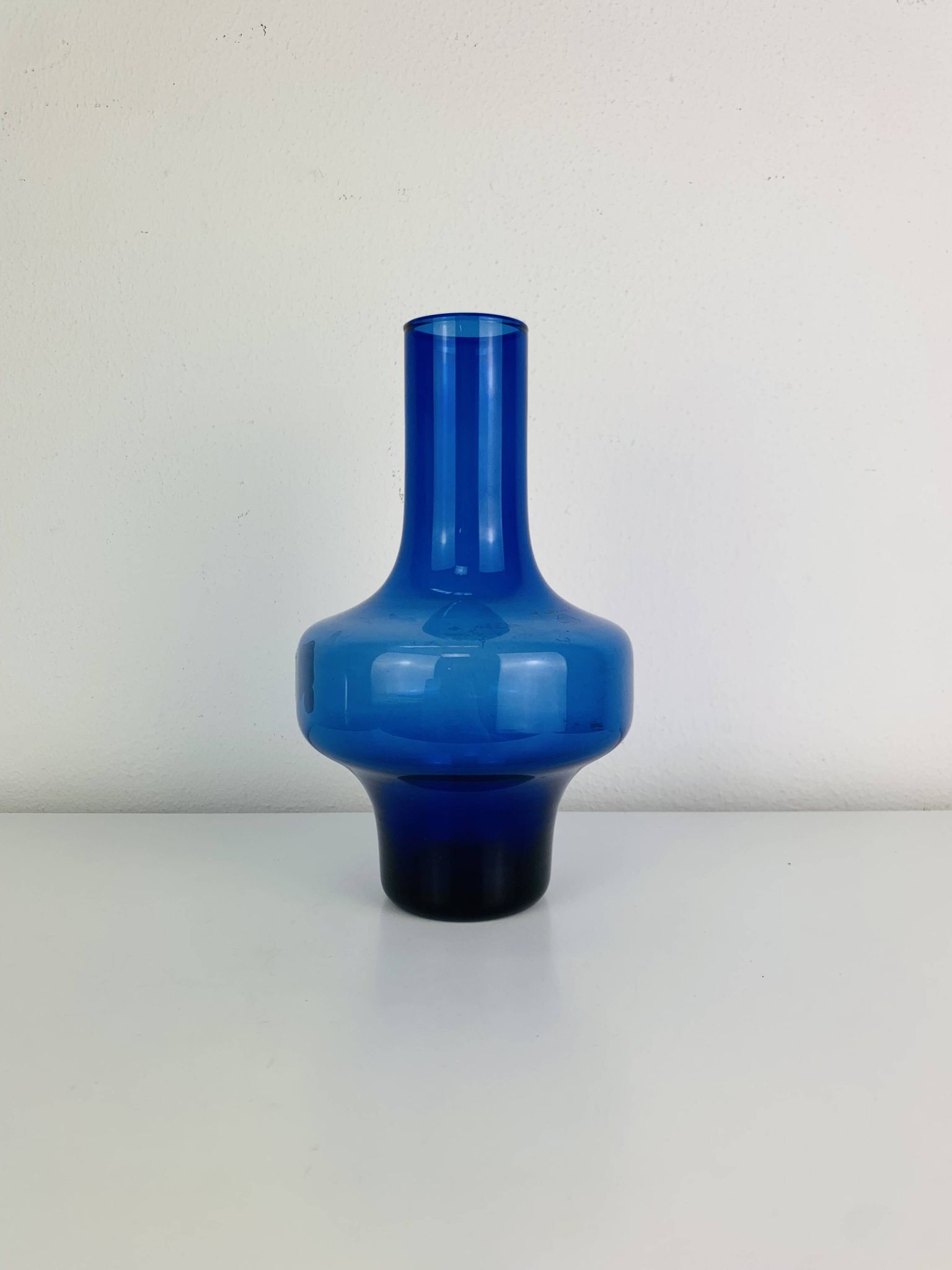 Blue glass vase in Scandinavian style from the 1960s, mouth-blown.