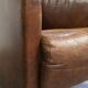 Fauteuil design aviateur en cuir de vache couleur cognac robuste