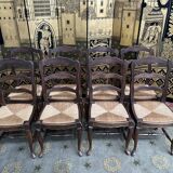Suite of 8 rustic mulched chairs with crisscross