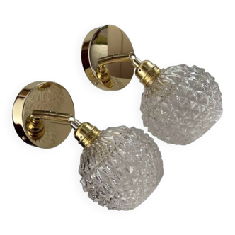 Pair of chiseled glass globe wall lights