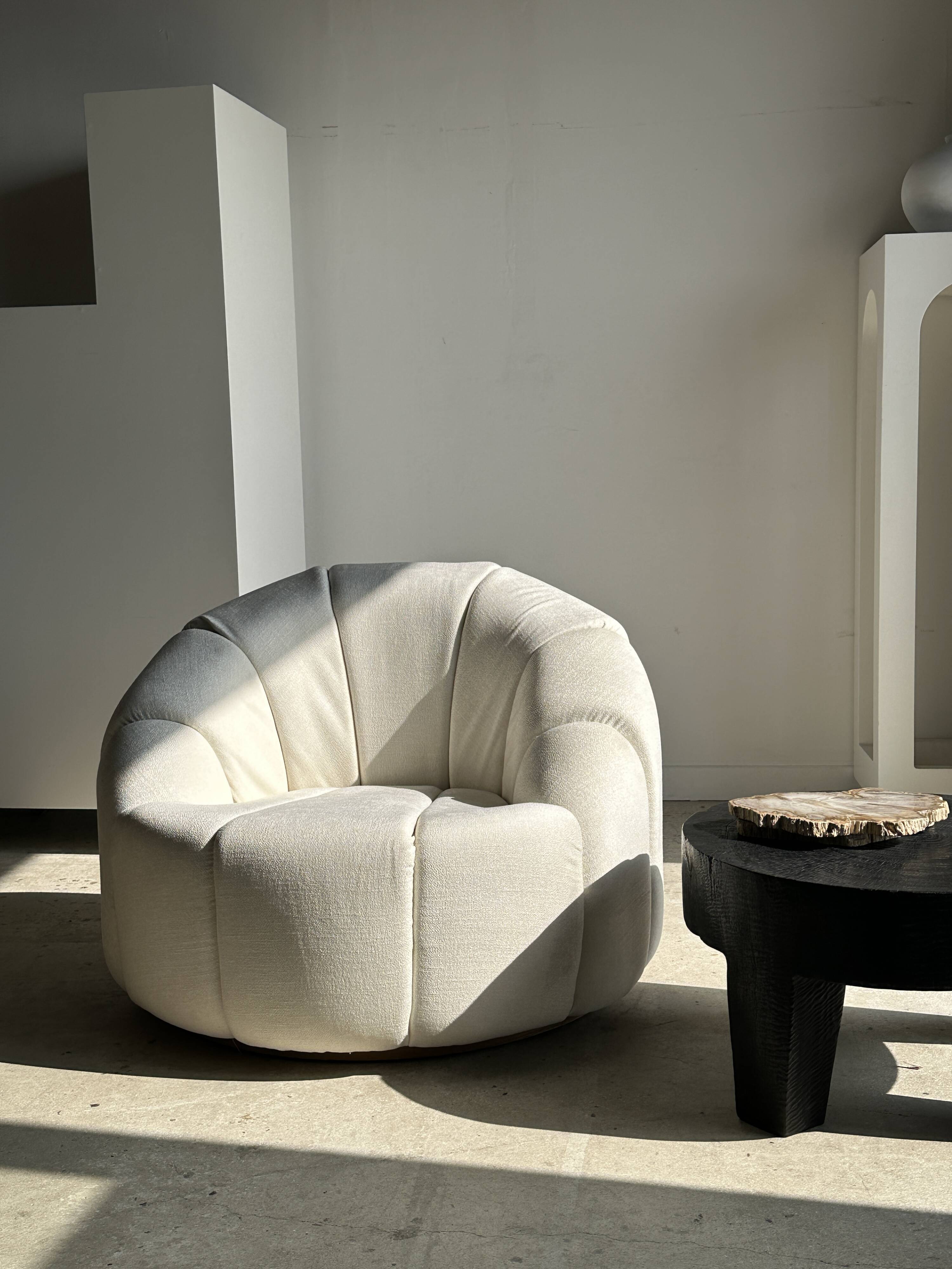 Large white circular armchair, white fabric upholstery