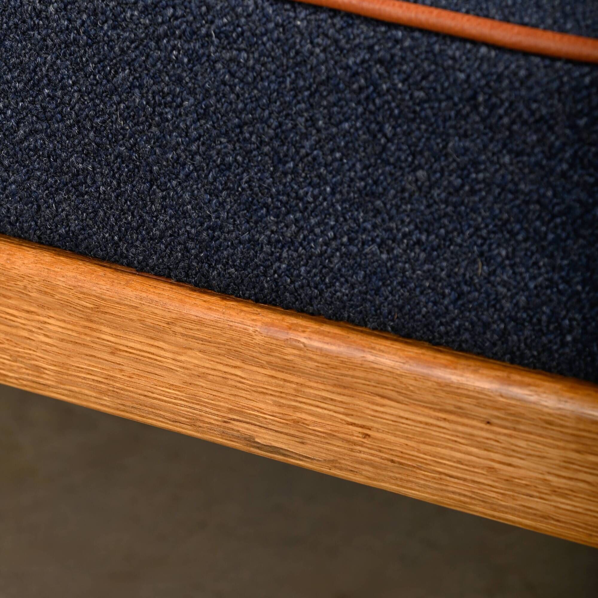 Scandinavian Daybed in Oak and dark Blue bouclé fabric with Leather accents