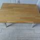 Vintage coffee table patinated pearl gray waxed finish, top against glued varnished oak