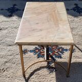 Living room table in gilded metal and marble.