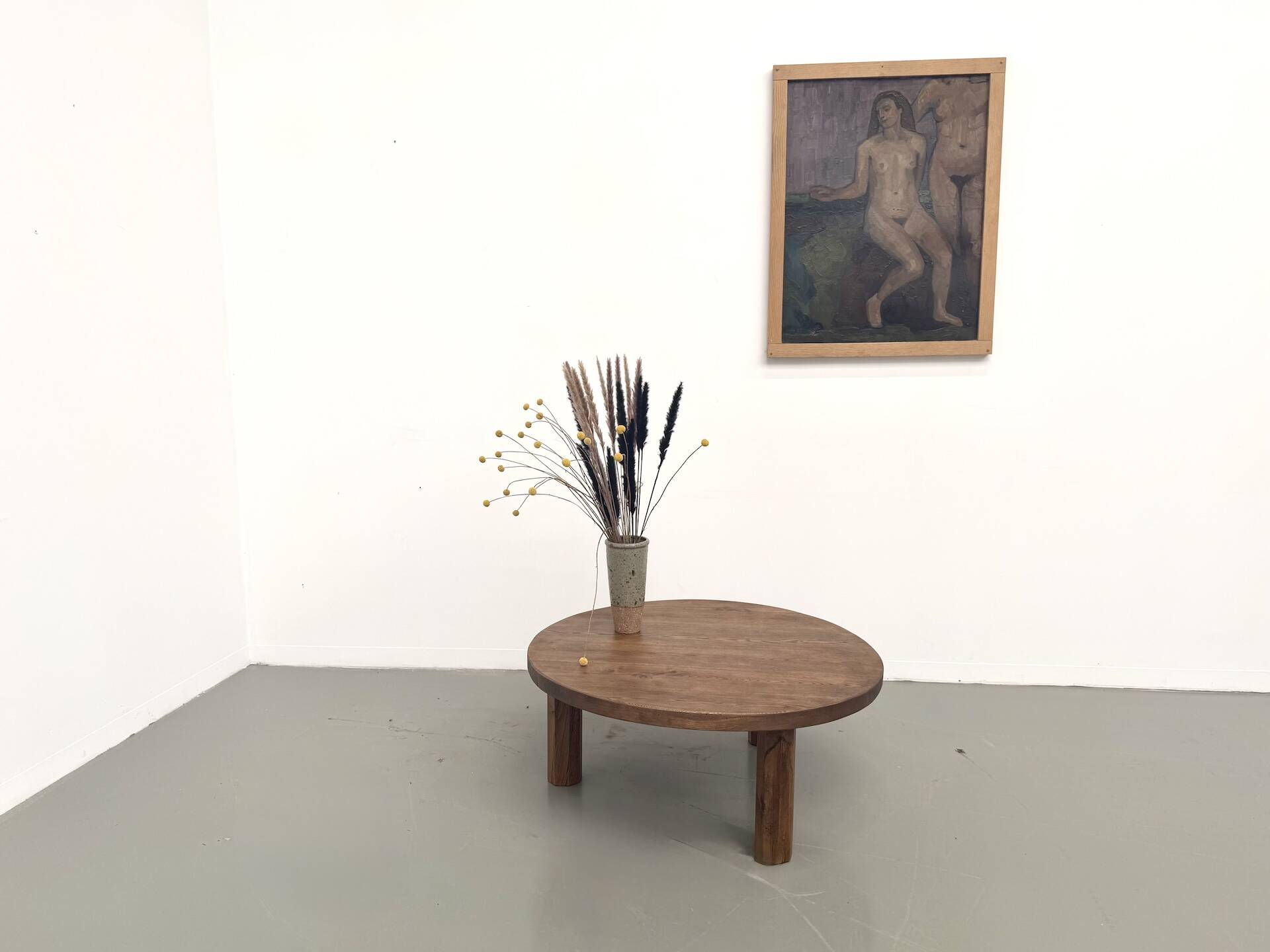 Round coffee table in solid oak, octagonal legs, France, 1950s.