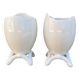 Antique porcelain egg cups in shell shape.