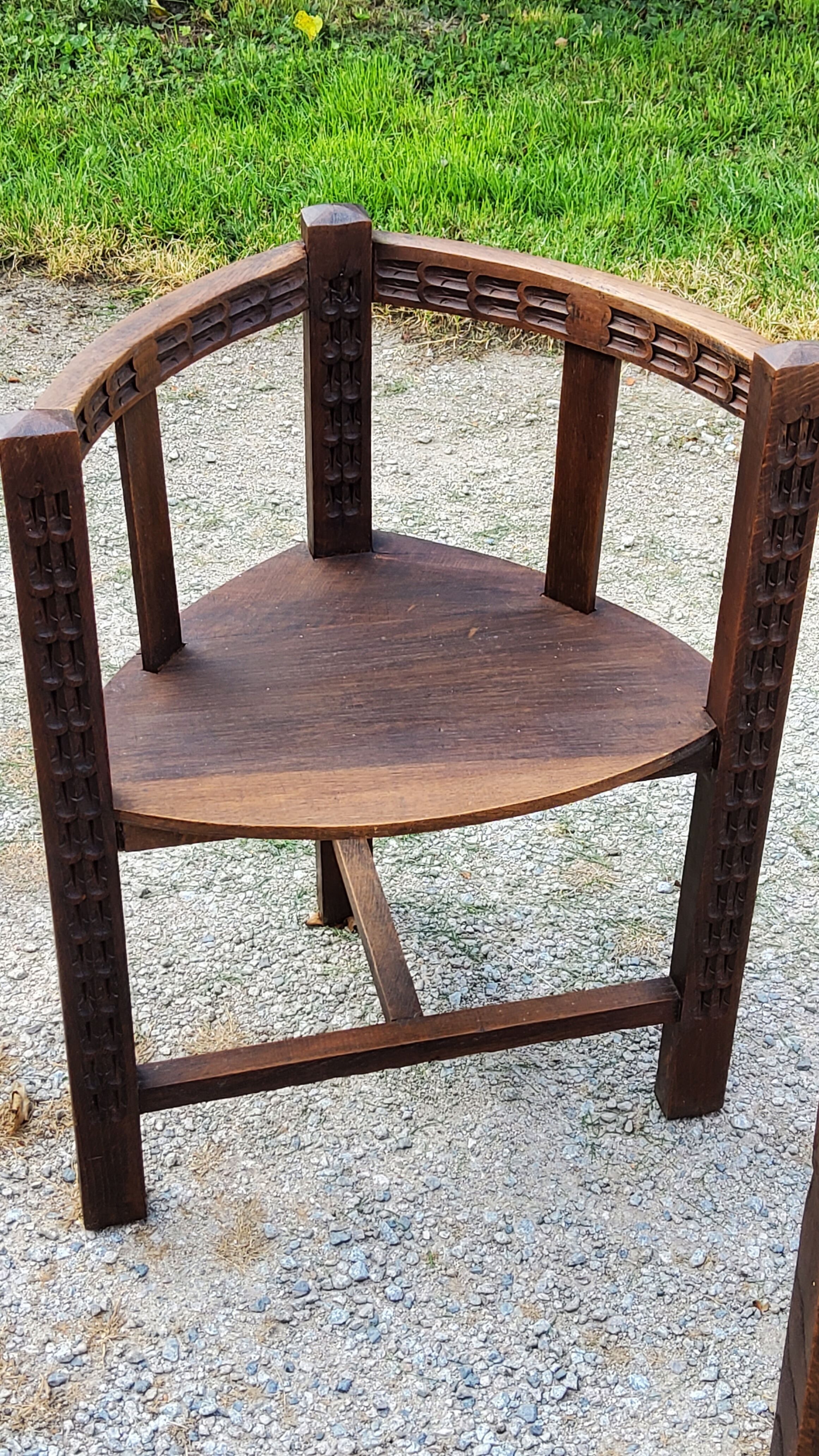 Set of three brutalist tripod armchairs in carved solid oak