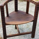 Set of three brutalist tripod armchairs in carved solid oak