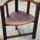 Set of three brutalist tripod armchairs in carved solid oak