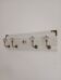 Wall-mounted coat rack 50 cm – 4 hooks and decorative central button