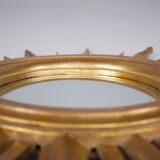 Sun mirror in gilded wood