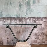 Console in glass and antique patinated metal