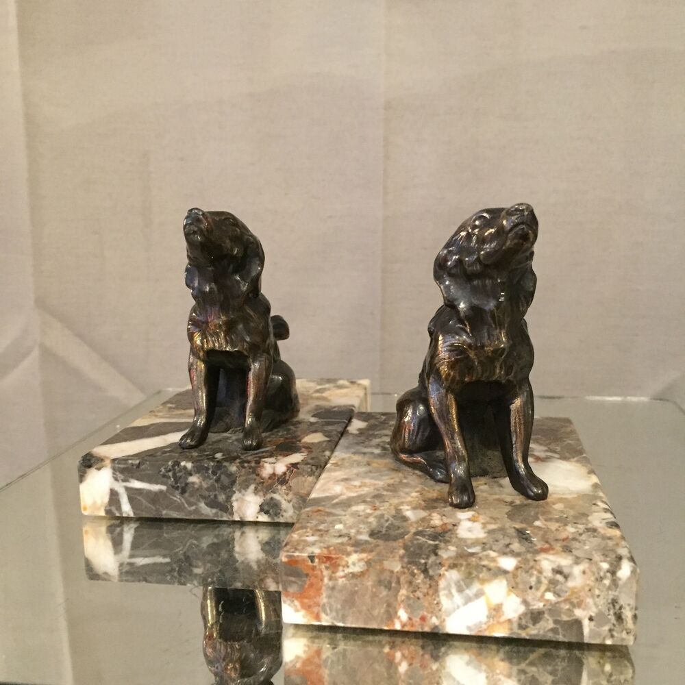 Pair of regular bookends representing dogs marble base