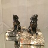 Pair of regular bookends representing dogs marble base