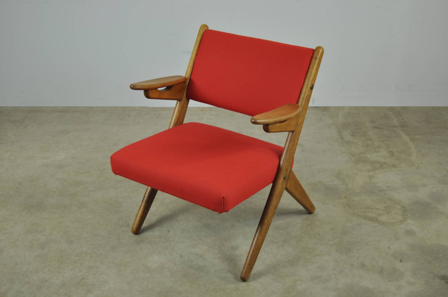 Classic Danish vintage scissor armchair by Arne Hovmand Olsen in OAK, 1960s