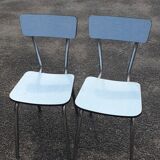 2 sky blue Formica chairs
