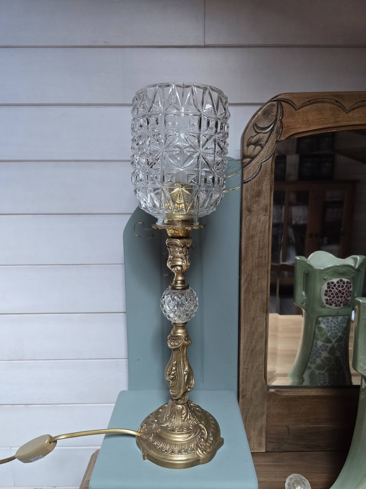 Brass floor lamp with a glass ball, cut glass globe.