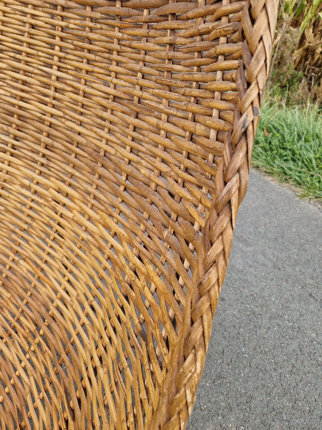 Large vintage metal and wicker armchair