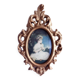 Medallion frame representing a little girl