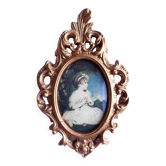 Medallion frame representing a little girl