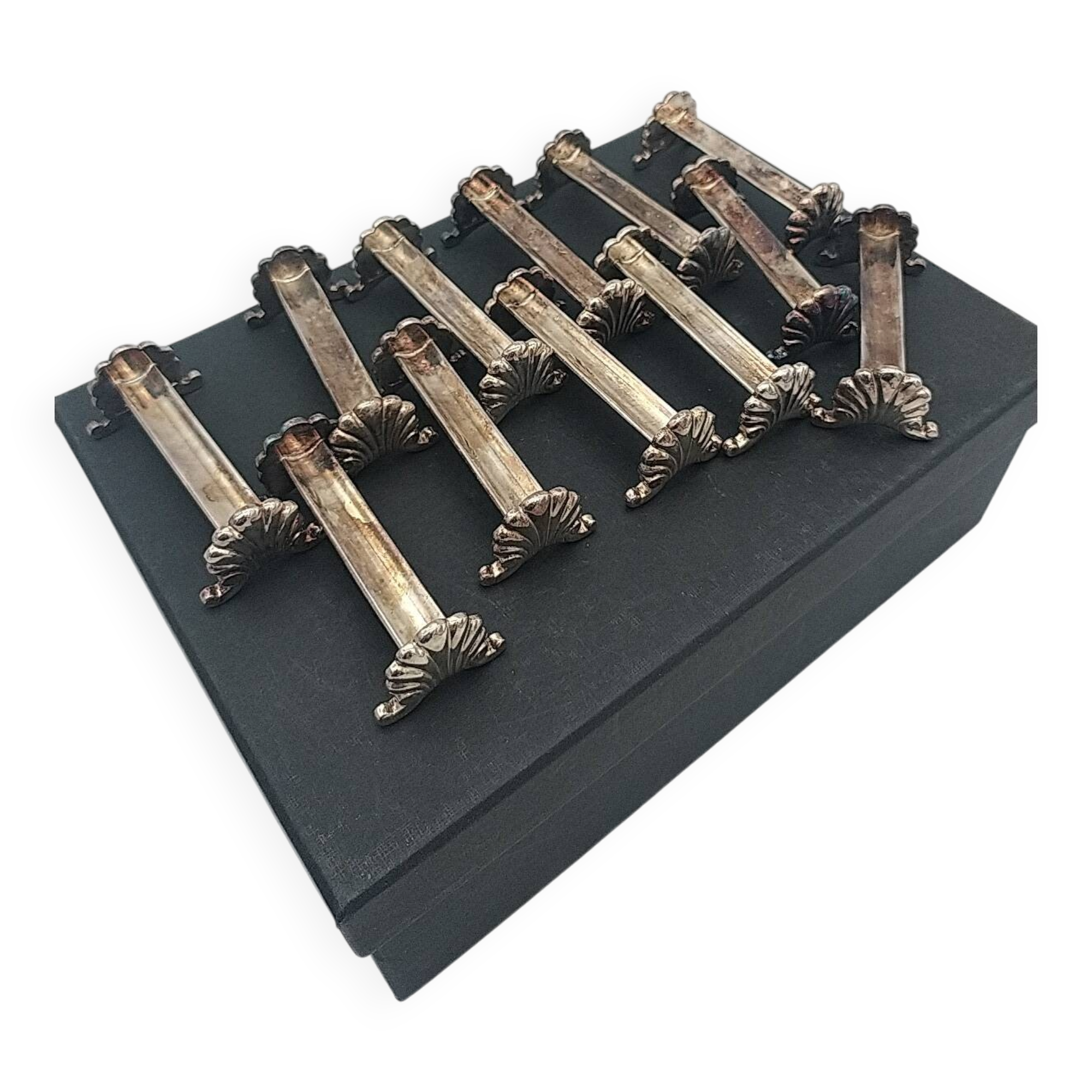 Silver-plated shell knife rests. Ravinet Denfert.