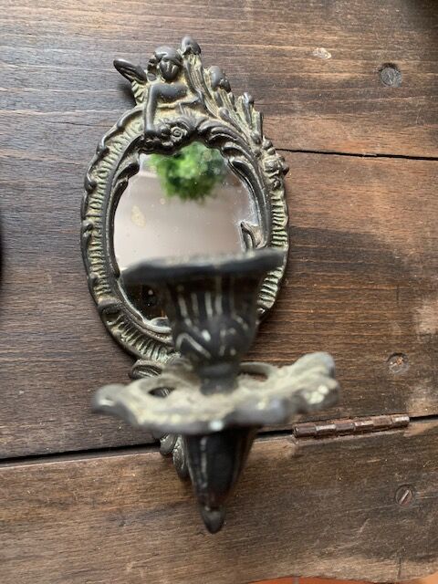 Pair of antique bronze candle holders