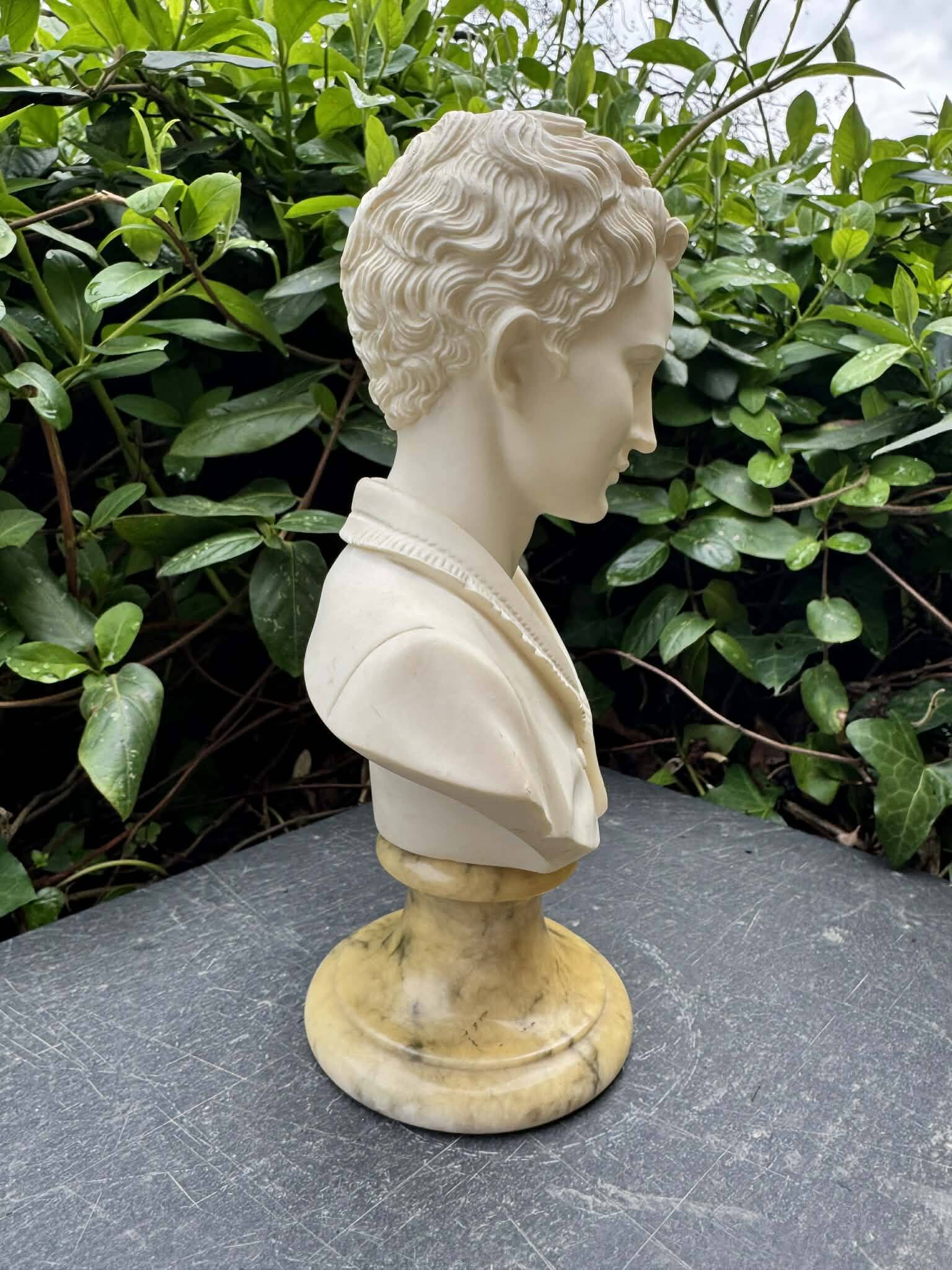 Alabaster bust of a woman signed Arnaldo Giannelli.
