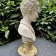 Alabaster bust of a woman signed Arnaldo Giannelli.