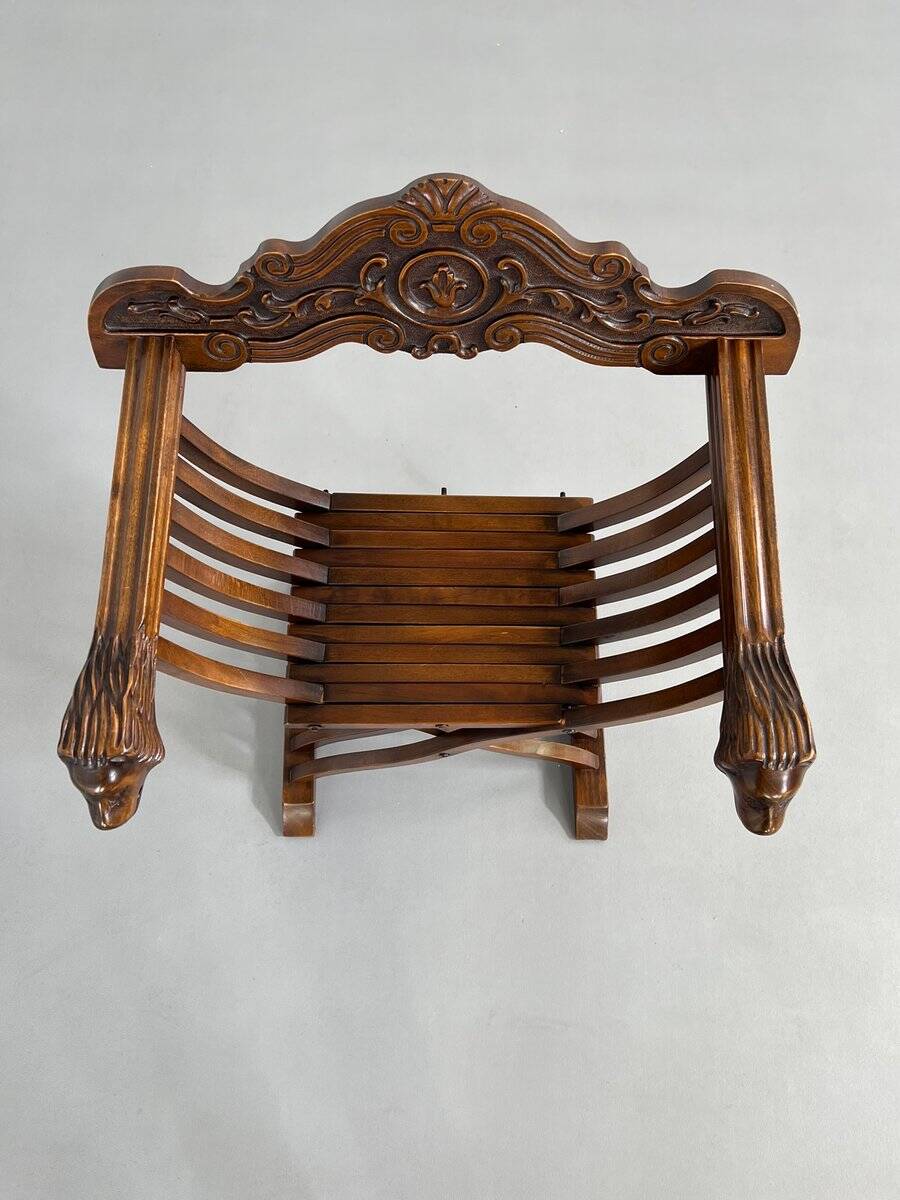 Fauteuil pliant vintage en bois sculpté