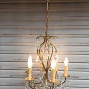 Remarkable cage chandelier with 6 lights and complete crystal pendants in working condition.