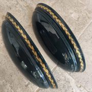Set of two vintage wall sconces in pine green and gold.