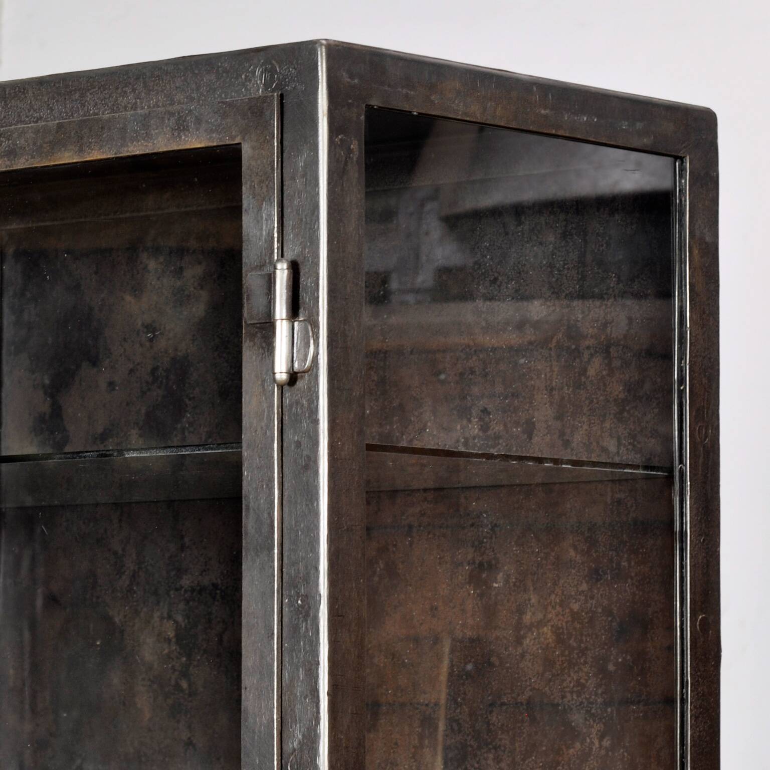 Polished iron medical cabinet, 1920s