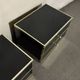 Pair of black lacquered and brass bedside tables, Roche Bobois 1970