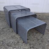 Nested tables with perforated metal from the 1980s.
