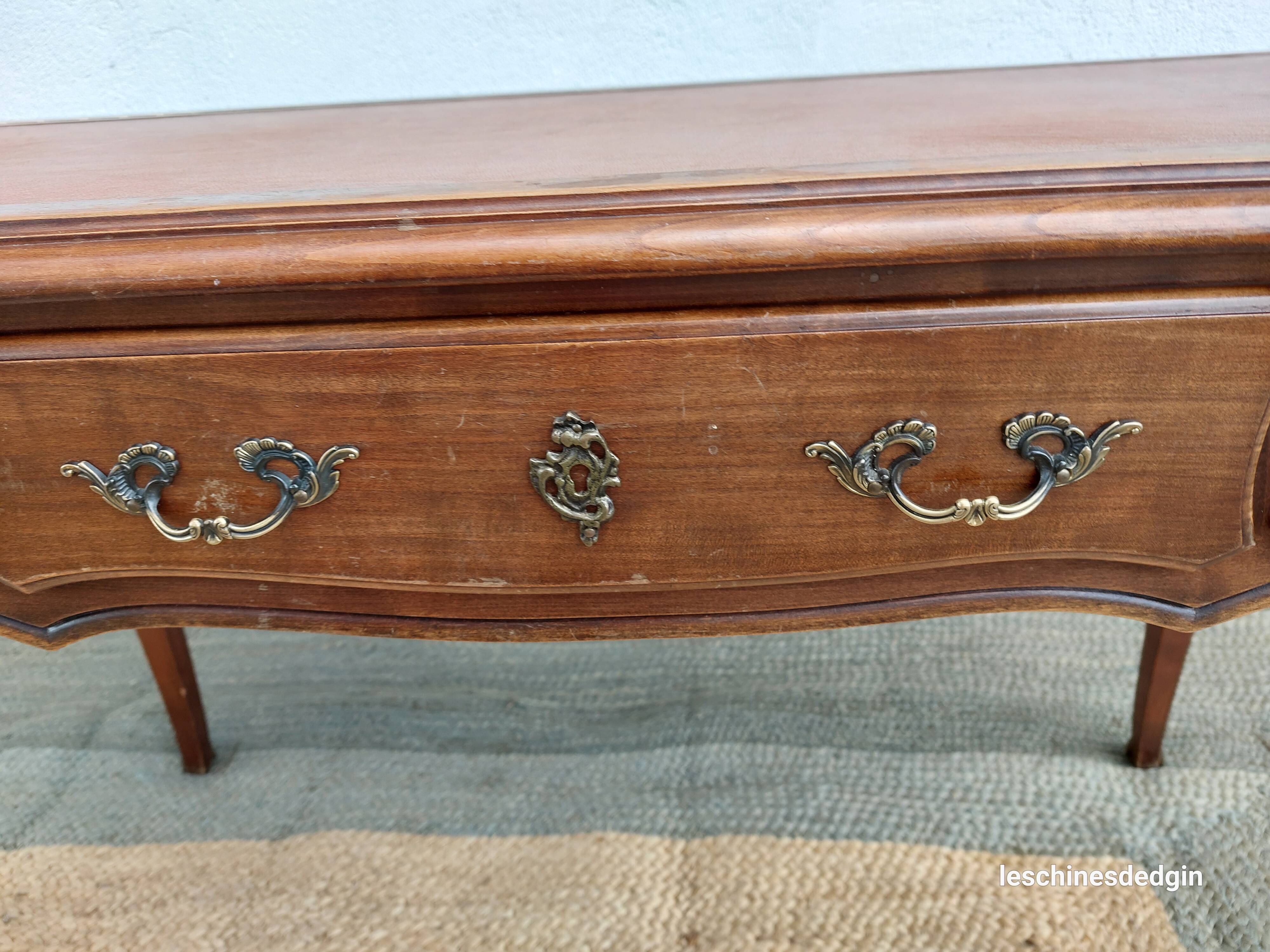 Louis XV style desk in wood, with a brown leather top.